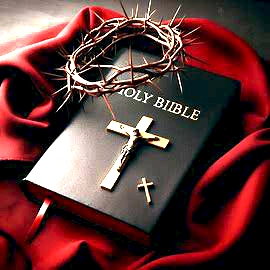 Photo of a Black Holy Bible with Gold Crucifix and Lettering, with a crown of thorns,laid over the upper-right corner. Both the Bible and the Crown of Thorns are laid upon a Blood Red Robe.