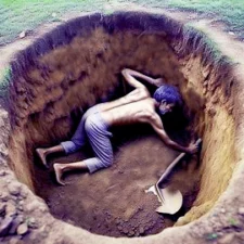 Image of a man in a deep and wide hole that he has dug for himself and by his own strenth. Without God's strength we are trapped by our own.